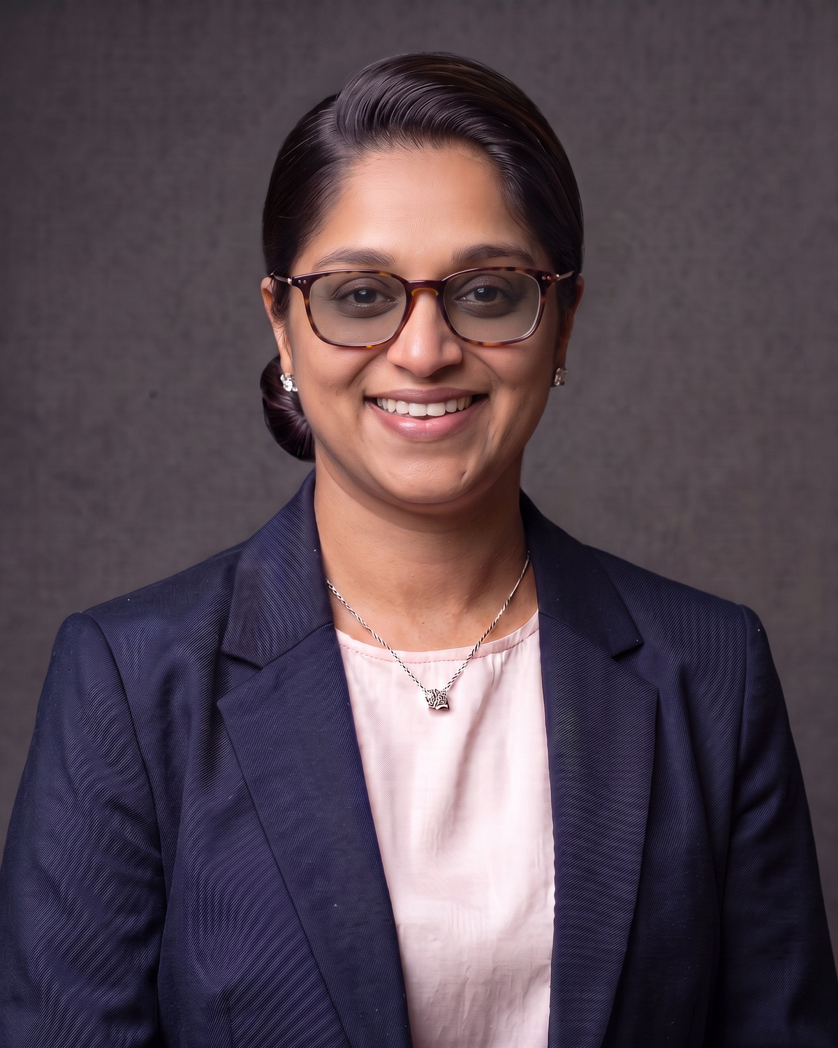 Portrait of Daisy Rajan, Co-Founder and Director of DAEB Group